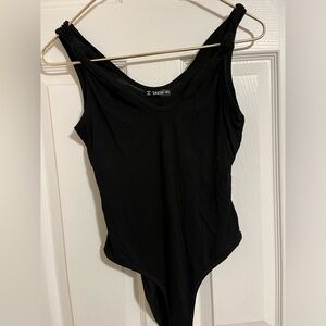 Sexy black body suit size small mint condition